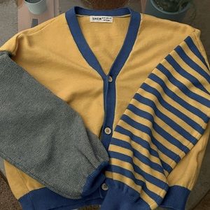 A yellow n blue stripe long sleeve shirt